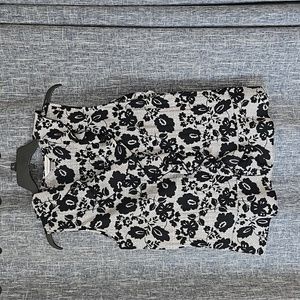 Black and white dressy sleeveless blouse